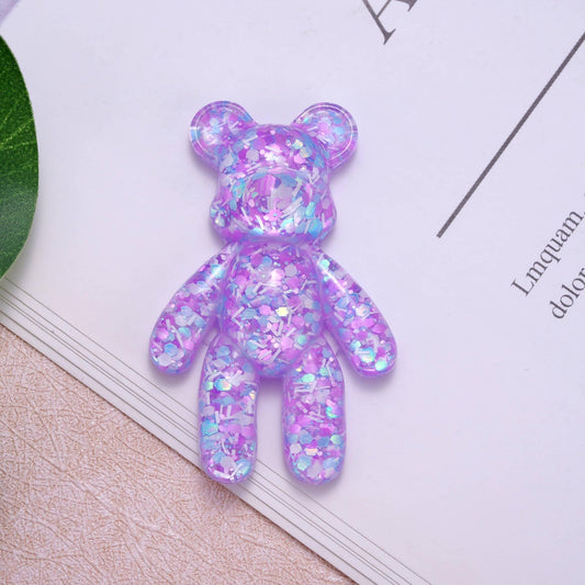 Aesnefe Pocket Bear Hug held in hand offering emotional support during anxious moments