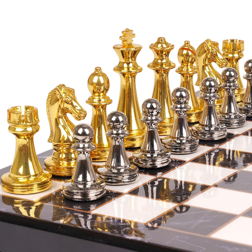 Agirlgle metal chess set with marbled board, elegant centerpiece