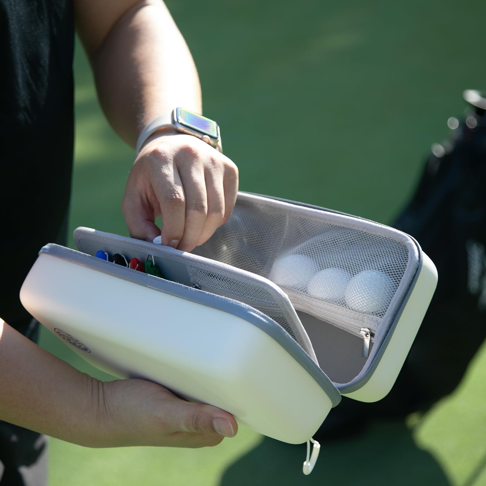 AGUstrike golf glove holder keeps gear within reach.