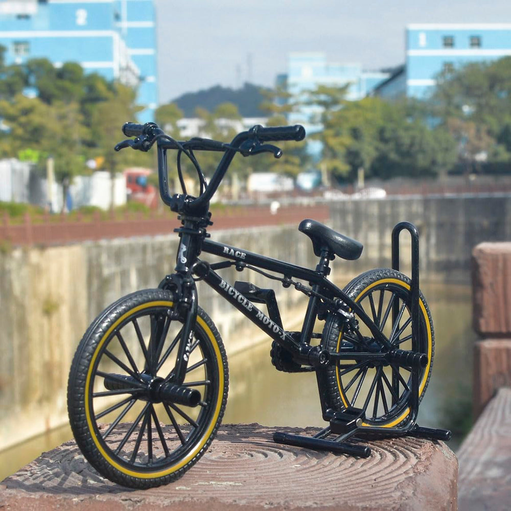 Close-up on handlebars and wheels highlights BMX-inspired detailing