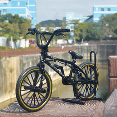 Close-up on handlebars and wheels highlights BMX-inspired detailing