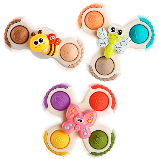 ALASOU suction spinner on fridge promotes tactile play and motor skills