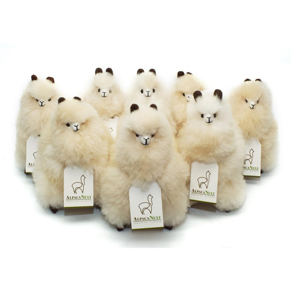 AlpacaNext nine-inch plush, compact and portable for travel or couch cuddles.