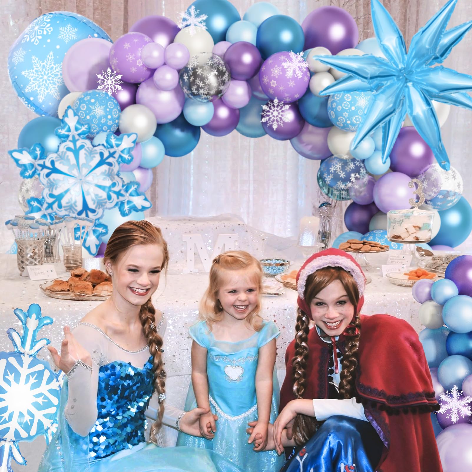 Amandir 12-inch balloons with snowflake confetti brighten the garland and backdrop