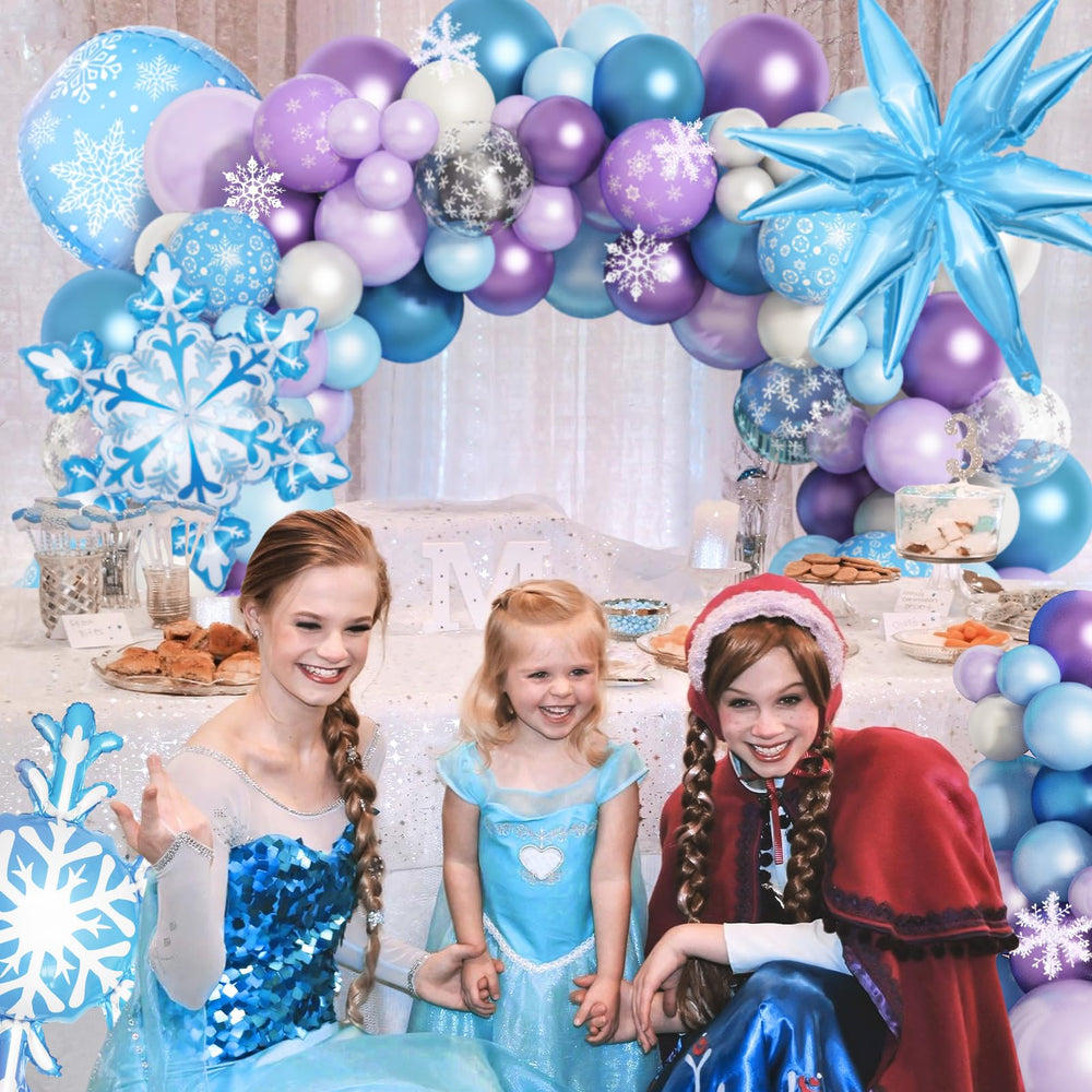 Amandir 12-inch balloons with snowflake confetti brighten the garland and backdrop