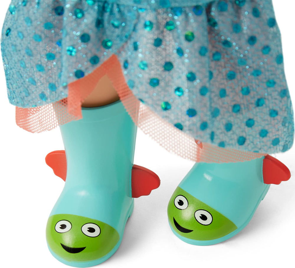 Camille blue wellie boots with red fins highlight playful footwear details.