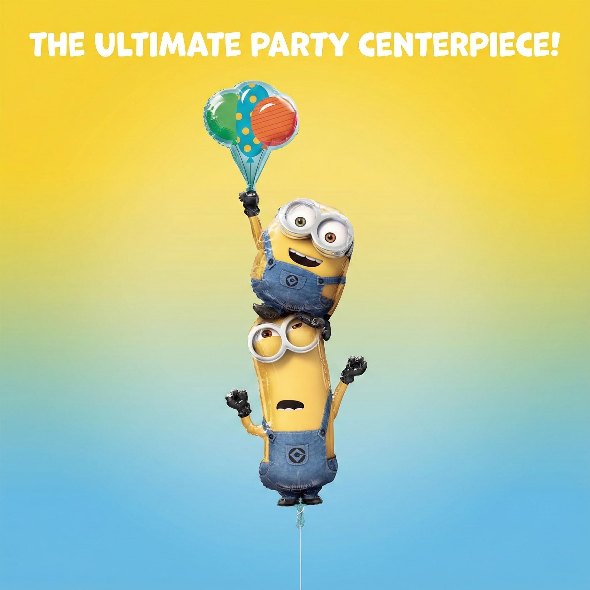 Anagram Minions Stacker Balloon accents the cake table setup.