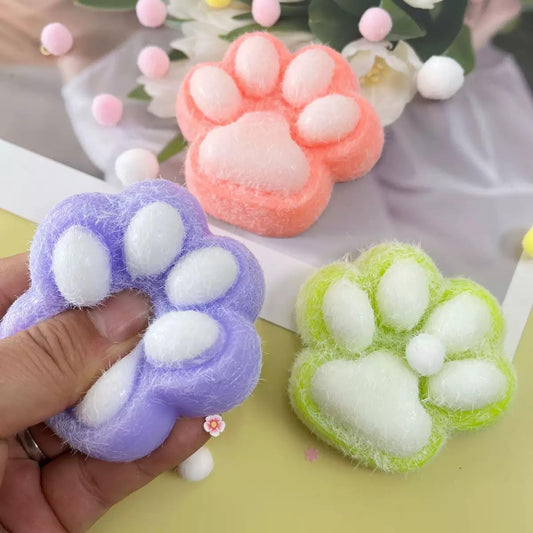 ANAOTA Taba Squishy Paw soft fur detail, comforting texture for relaxation.