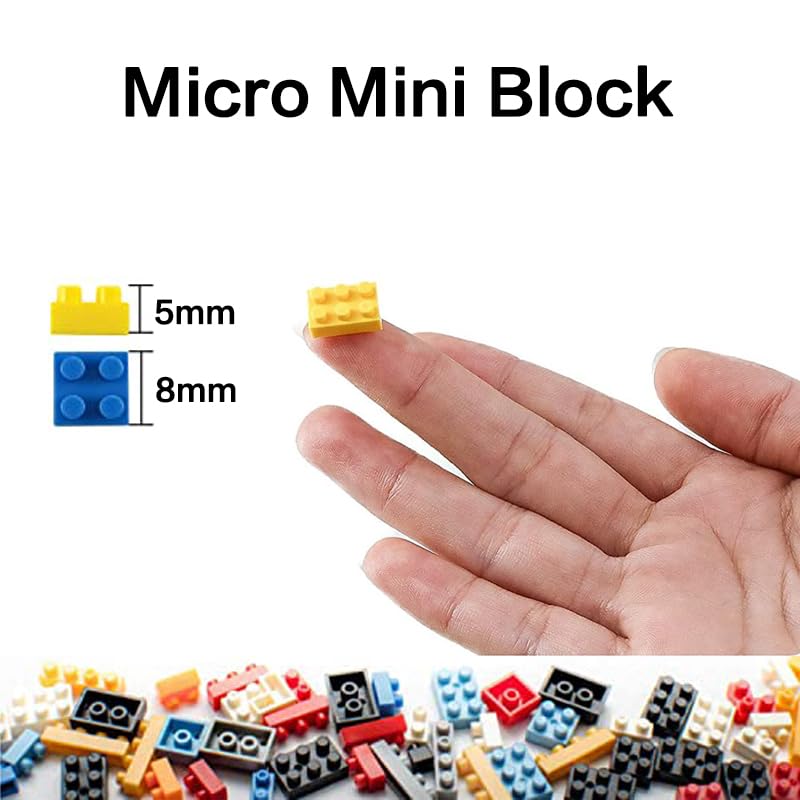 An adult hobbyist builds with Aningde micro blocks, illustrating focused work and progress.