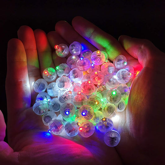 Aogist mini ball light close-up showing multicolor glow.