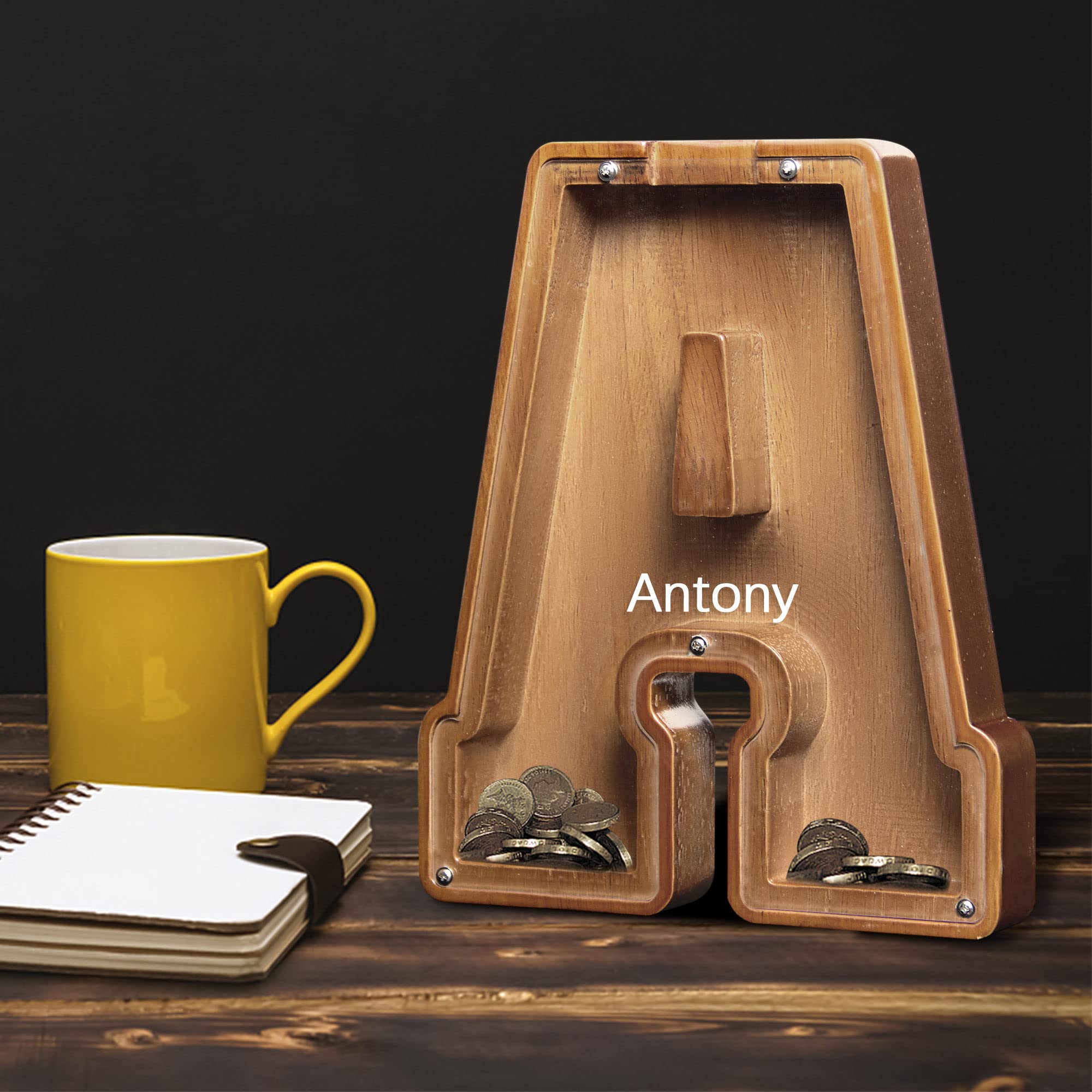 AORCMITN table decor piggy bank doubles as a cute shelf accent.