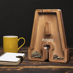 AORCMITN table decor piggy bank doubles as a cute shelf accent.