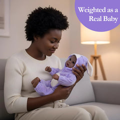 Aori Black Baby Doll includes nursing bottle and pacifier for nurturing routines.