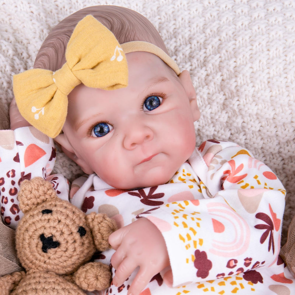 Aori lifelike 20-inch doll face close-up showing realistic features for imaginative play.