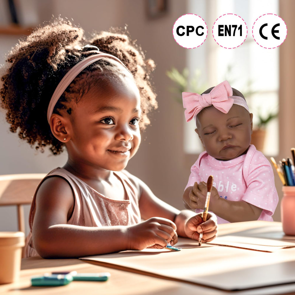 Aori feeding kit included with black 18-inch reborn doll supports imaginative care play.