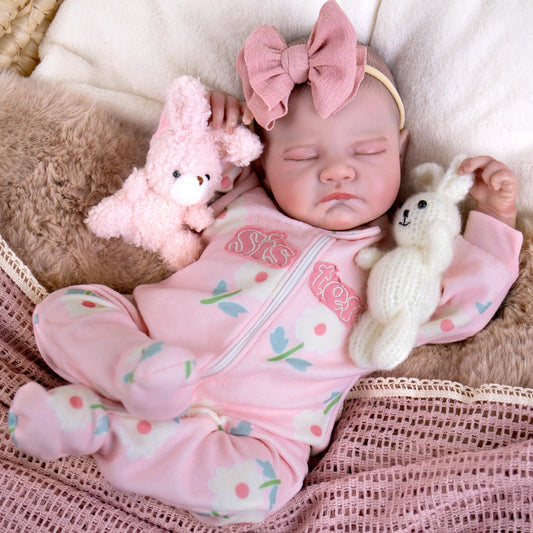 Aori 20-inch sleeping-face reborn doll offers soothing realism for play and display.