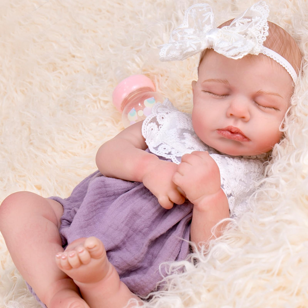 Aori Realistic Reborn Baby Doll 20-inch face close-up shows lifelike blush and lashes for imaginative play