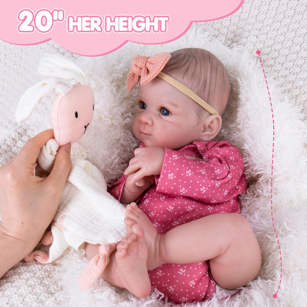 Aori Reborn Baby Doll Girl with nursing bottle and magnetic pacifier for nurturing play.