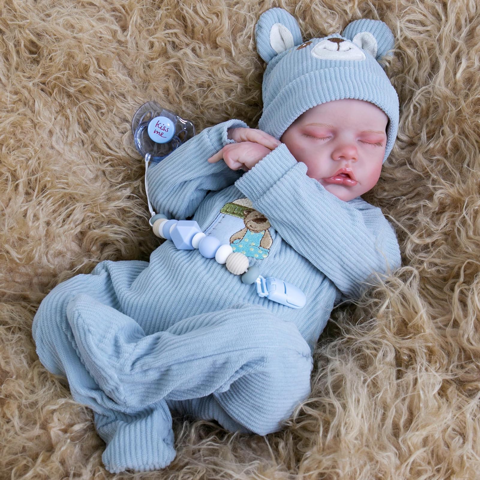 Aori Reborn Baby Doll Boy weighted body provides realistic hold during pretend caregiving