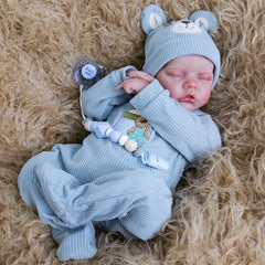 Aori Reborn Baby Doll Boy weighted body provides realistic hold during pretend caregiving