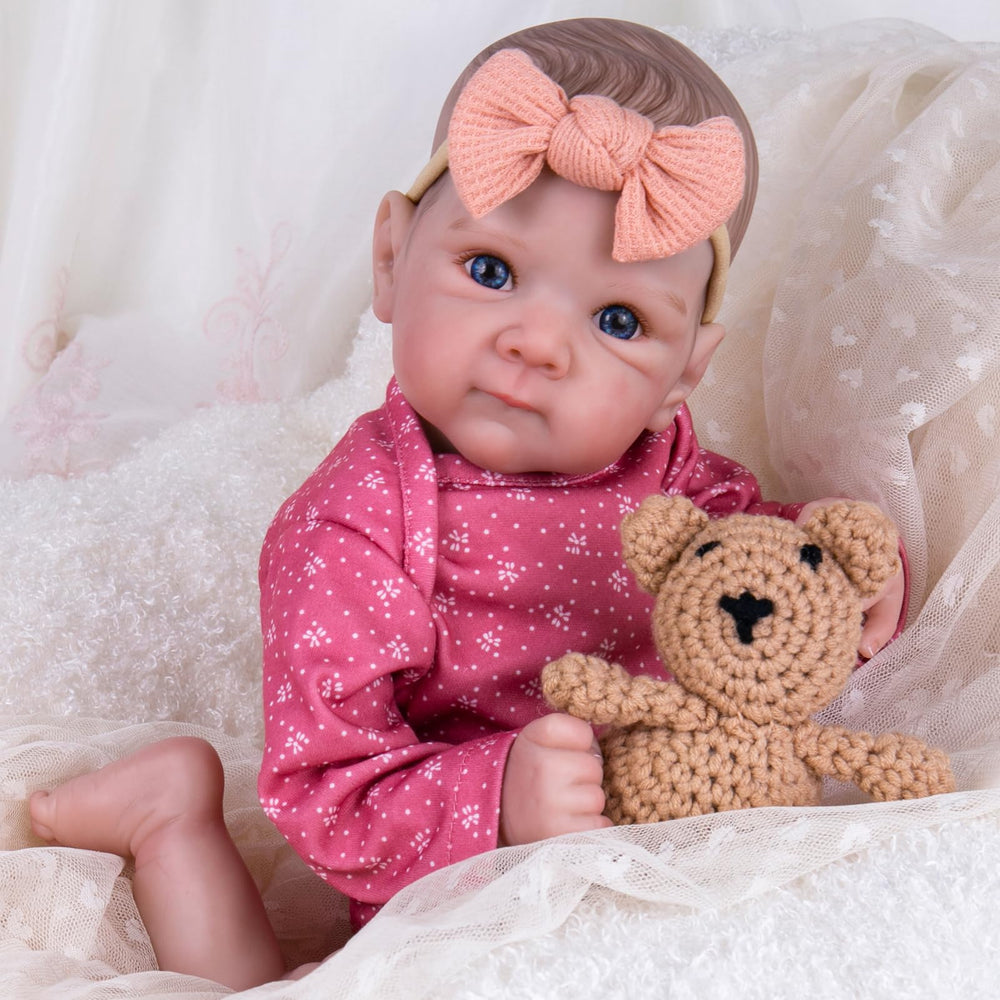 Aori Reborn doll with weighted cloth body enhances cuddling realism and comfort.