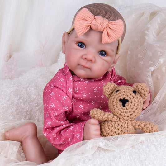 Aori Reborn doll with weighted cloth body enhances cuddling realism and comfort.