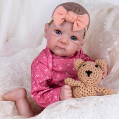 Aori Reborn doll with weighted cloth body enhances cuddling realism and comfort.