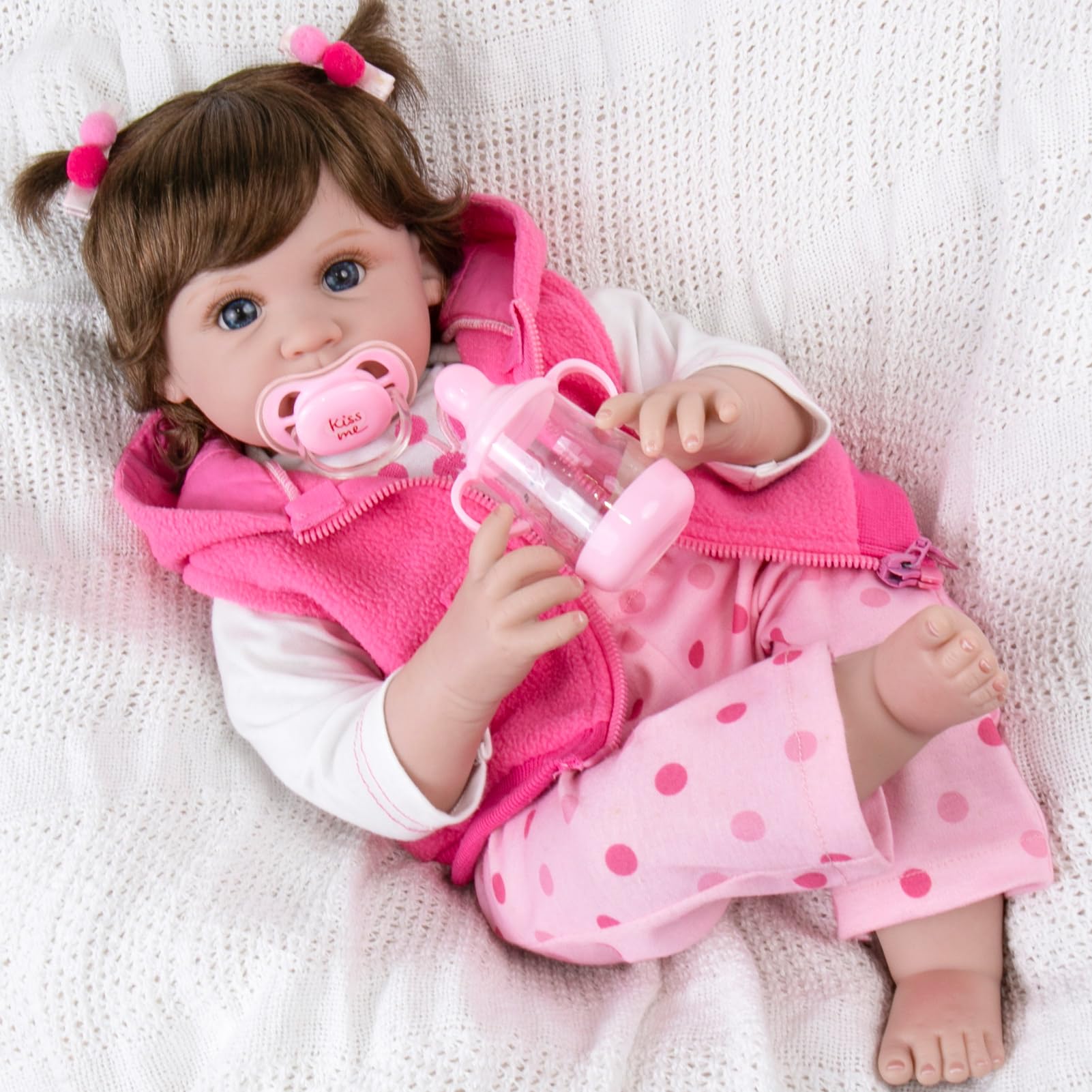 Aori Reborn doll with hand-applied wig hair for authentic styling.