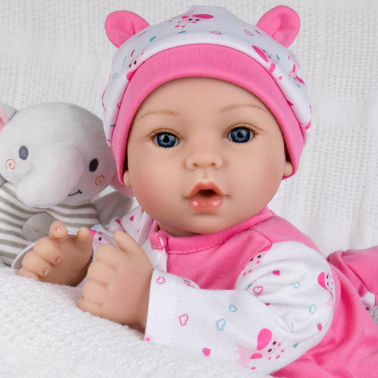 Aori reborn doll in pink onesie supports nurturing role play and bonding.