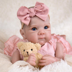 Aori Reborn 20in cloth body highlights cuddly feel for nurturing play.