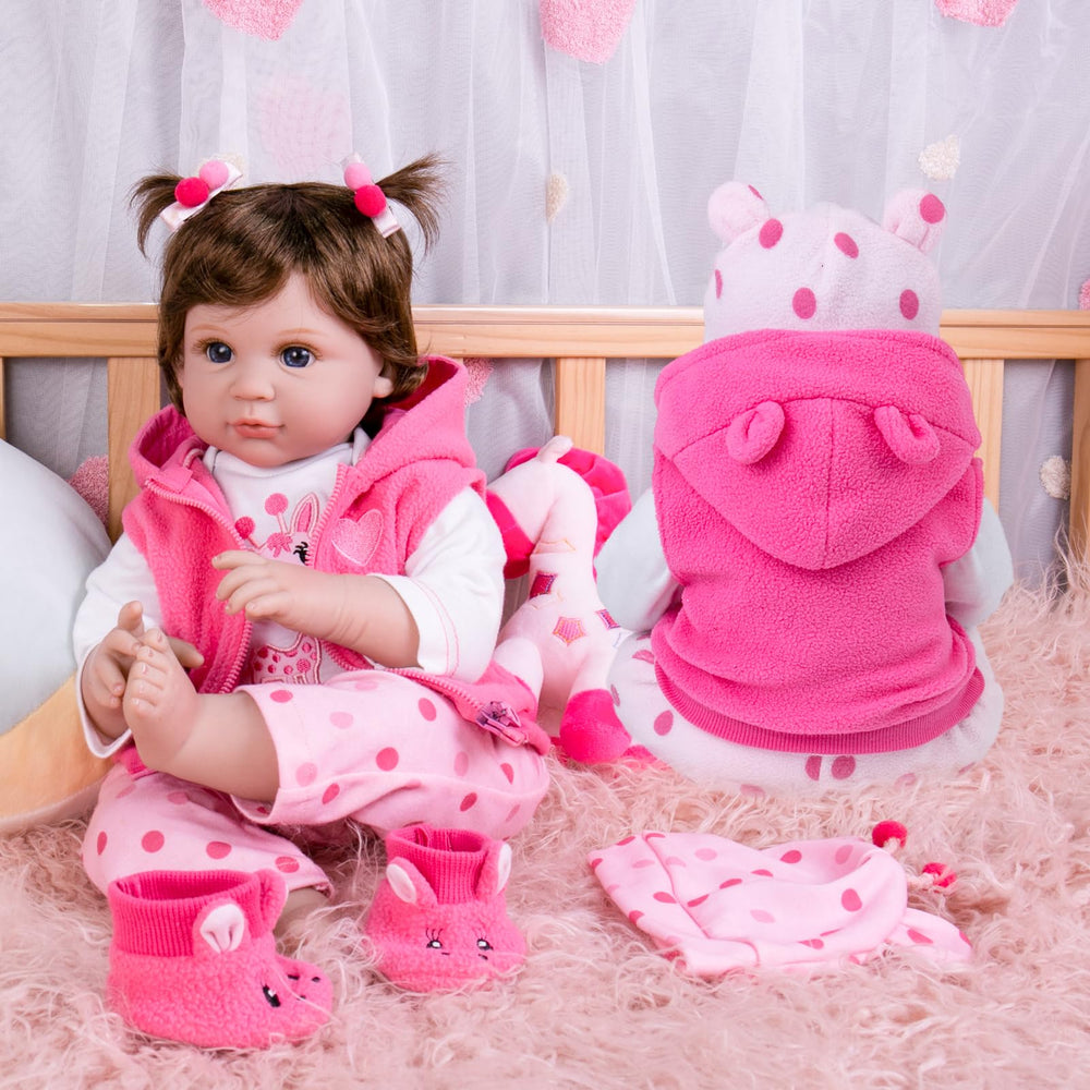 Aori Reborn pink vest with hood provides cozy layering for dolls.