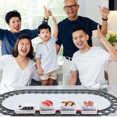Apettoey sushi train serves as a festive centerpiece under the Christmas tree.