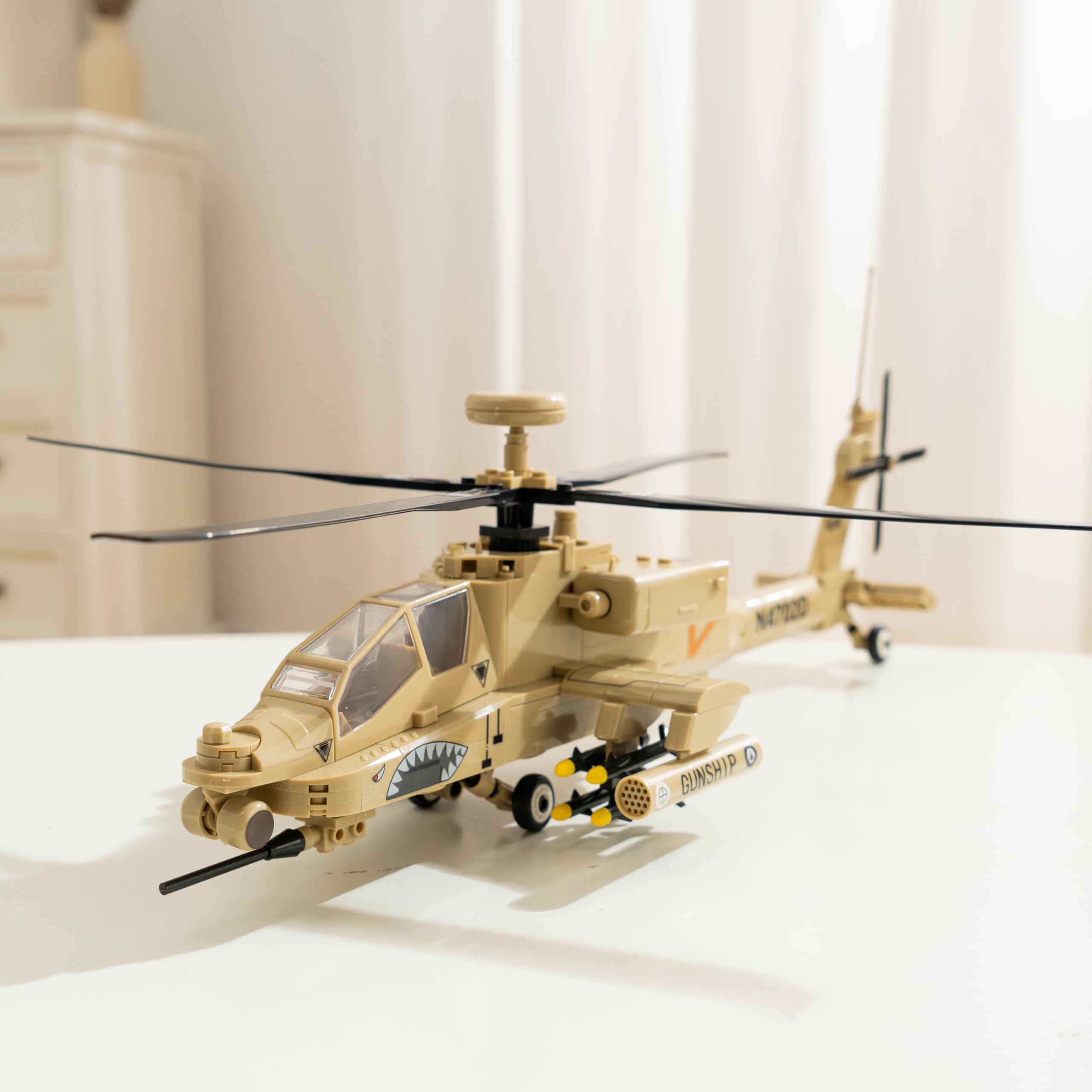 Apostrophe Games AH-64 Apache side view shows authentic detailing for immersive pretend missions.