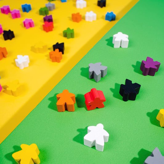 Apostrophe Games wooden meeples with safe finishes for durable classroom play.