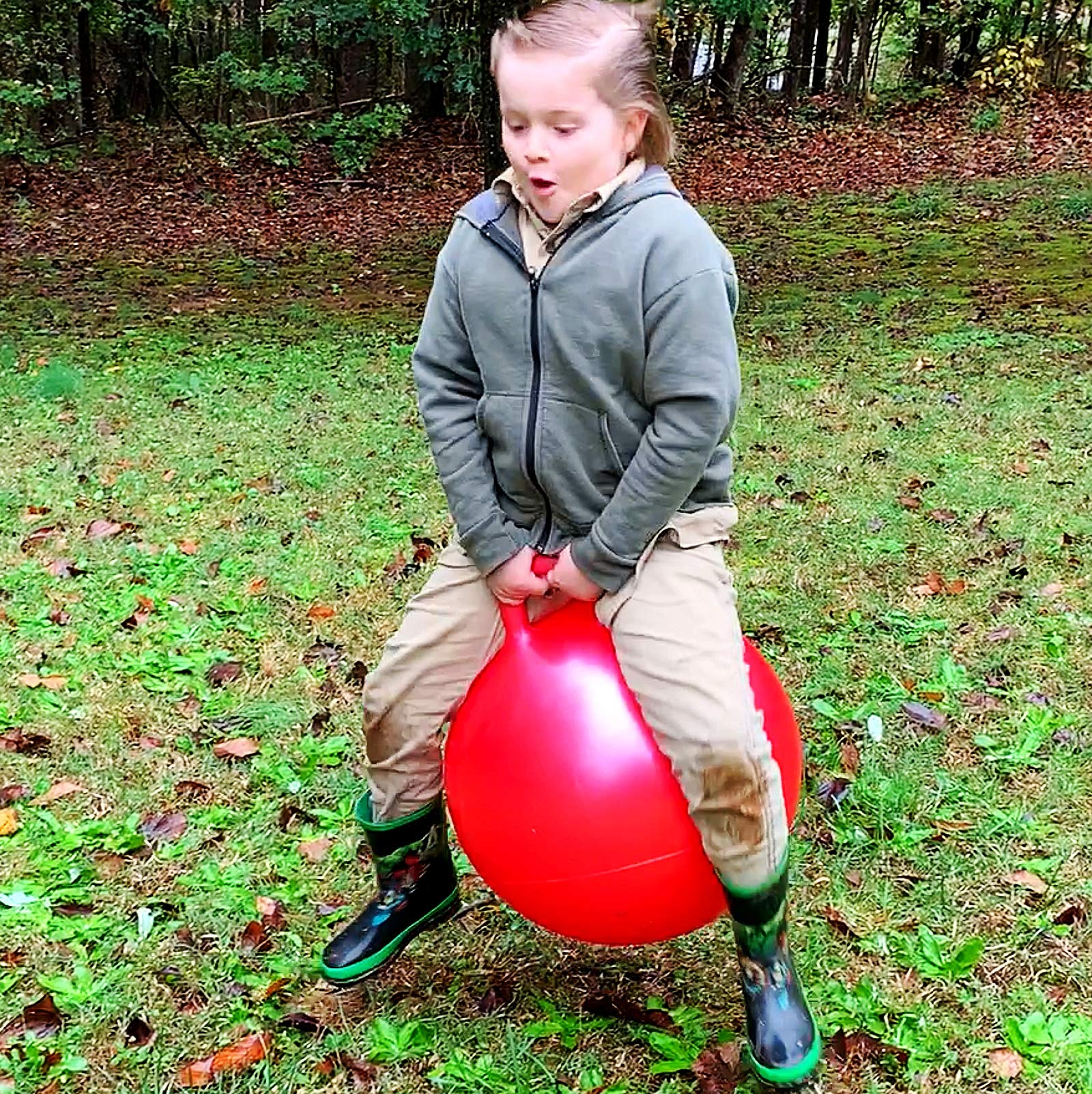 AppleRound Space Hopper Ball ready for outdoor fun on grass.