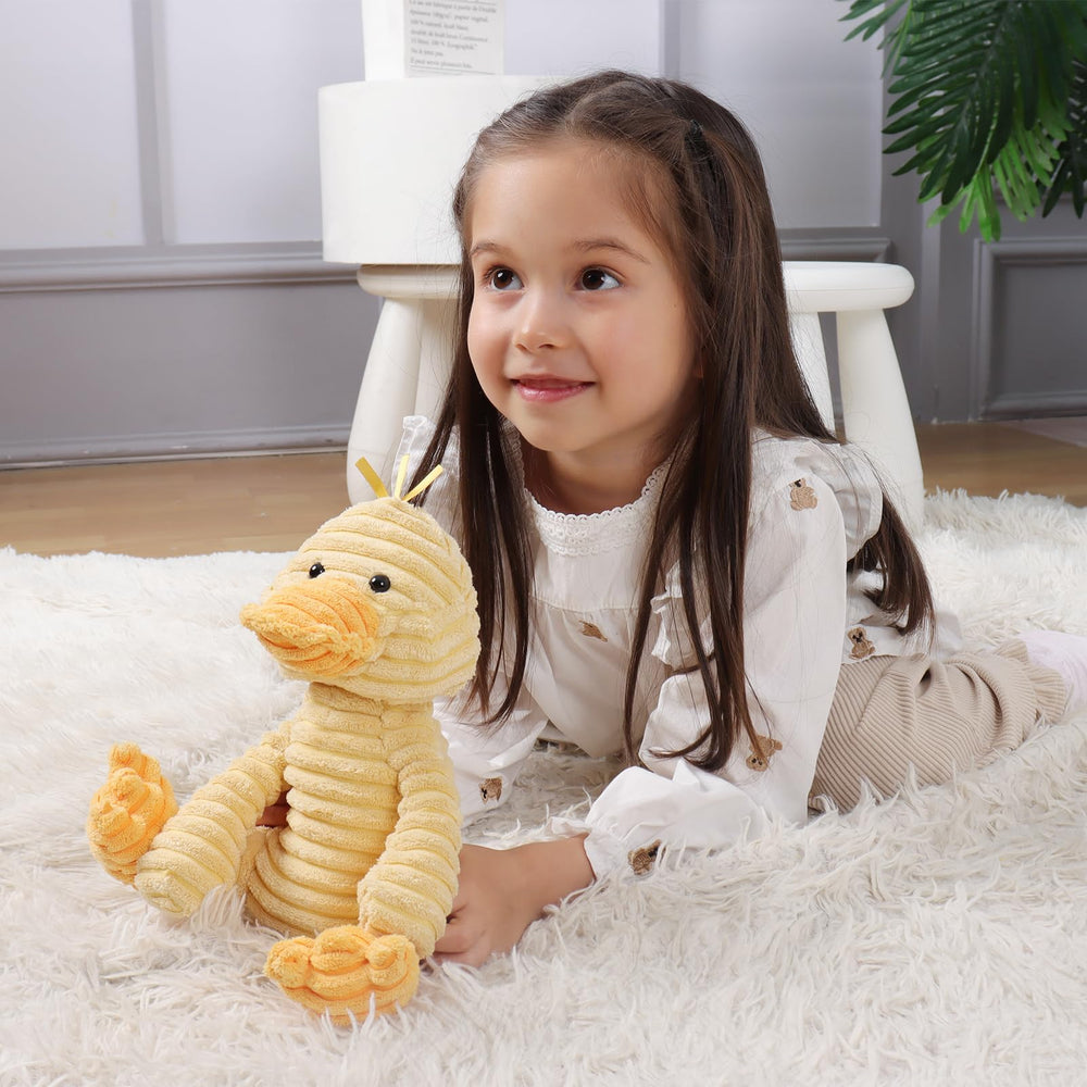 Apricot Lamb corduroy duck side view highlights its portable, huggable size.