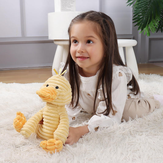 Apricot Lamb corduroy duck side view highlights its portable, huggable size.