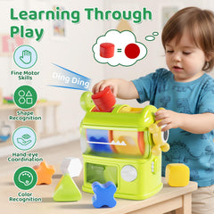 Aprilwolf lever drop folds blocks into a storage tray, teaching cause and effect.