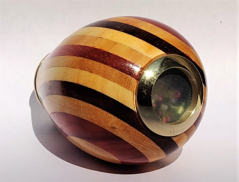 Arch Instruments wooden kaleidoscope front view highlighting light reflections