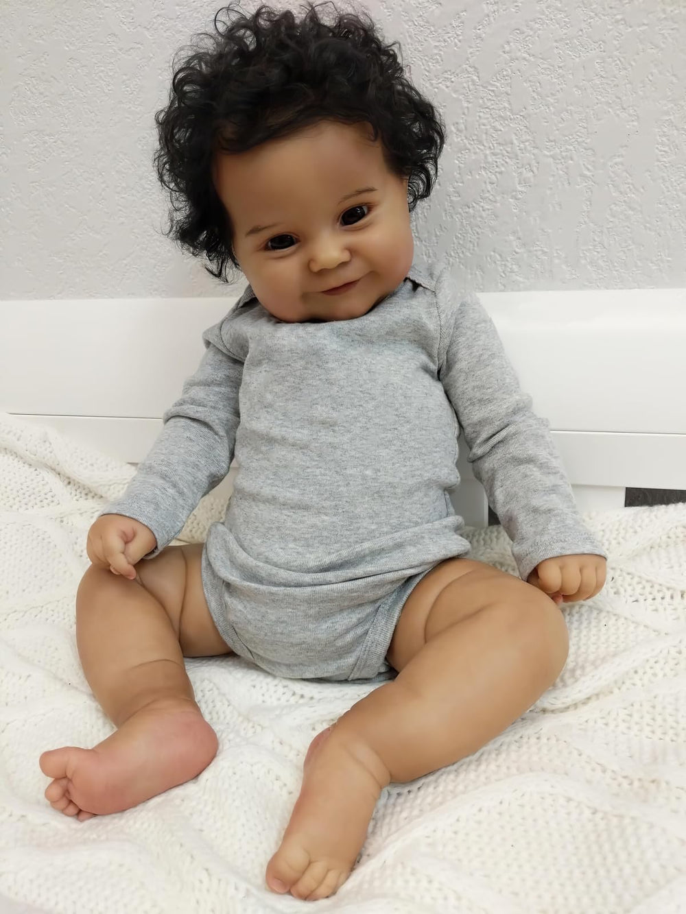 Ardol 20-inch reborn doll with lifelike baby face for display and storytelling