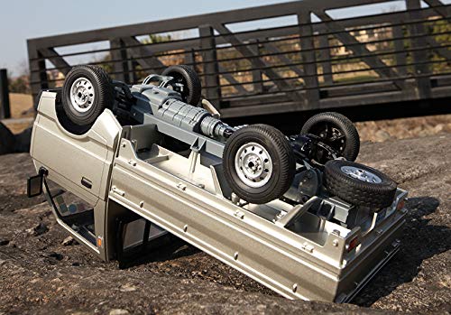 ARRIS WPL D12 drift action demonstrates responsive control on loose surfaces.