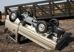 ARRIS WPL D12 drift action demonstrates responsive control on loose surfaces.