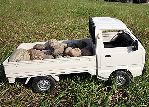 ARRIS WPL D12 off-road trail emphasizes rugged chassis and tire grip.