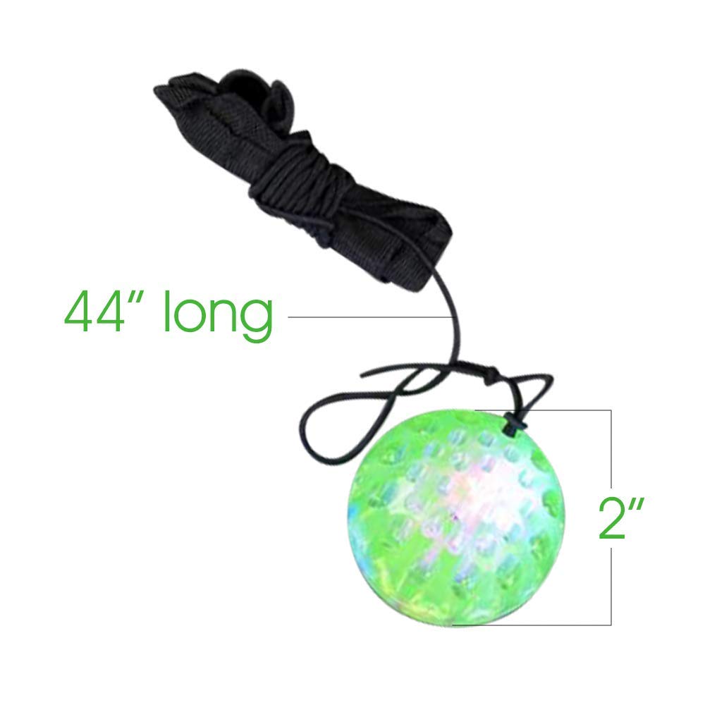 ArtCreativity glow-in-the-dark orbit ball used for outdoor play at dusk.