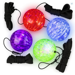 ArtCreativity light-up orbit ball on wrist glowing red and blue for dusk play.
