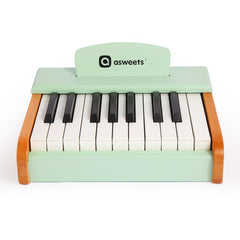 Gift-ready wooden piano from Asweets, highlighted by green finish for birthdays