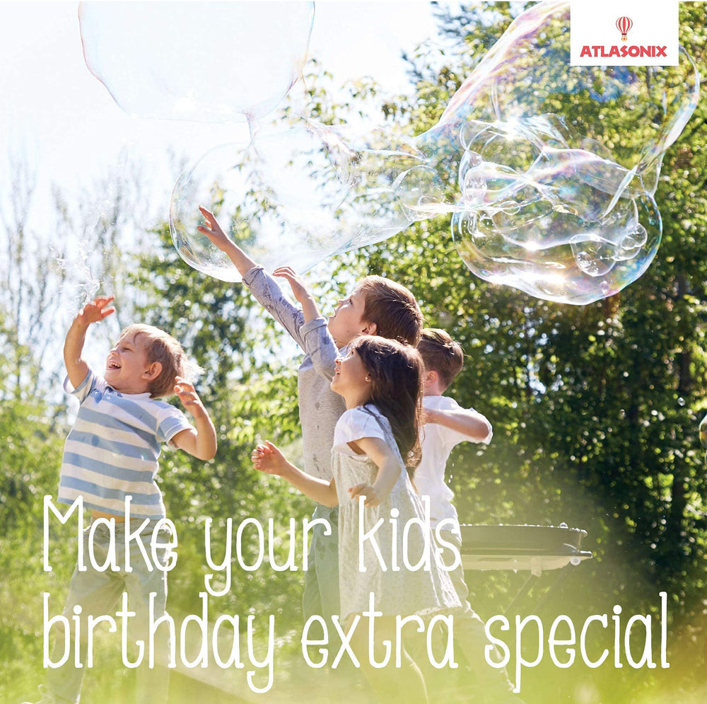 Giant bubbles soaring during a family outdoor bubble activity.