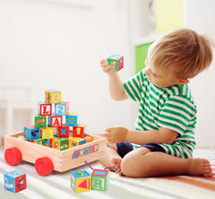 Atoylink blocks and wagon support hand-eye coordination through guided stacking