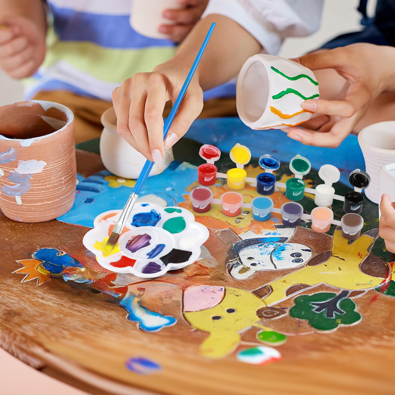Aujazyble apron keeps kids clean during art sessions.