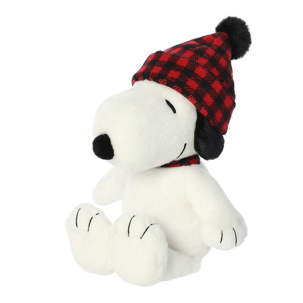 Aurora Snoopy plush in winter plaid packaging shot suggests a ready gift option